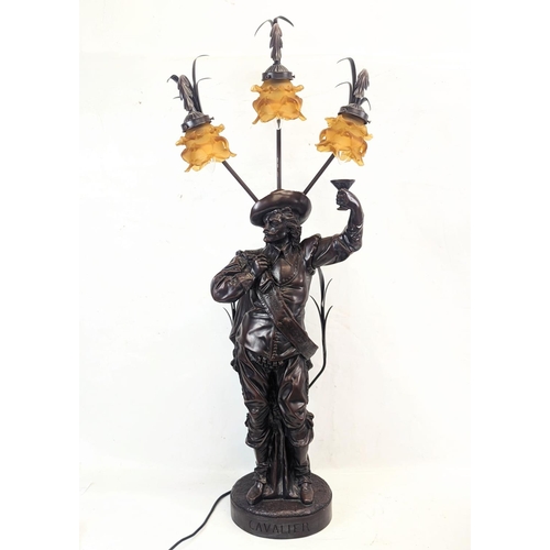 95 - A large resin bronze effect Cavalier lamp. 106cm