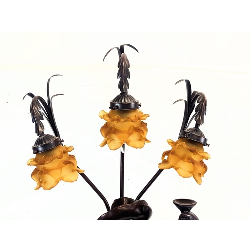 95 - A large resin bronze effect Cavalier lamp. 106cm