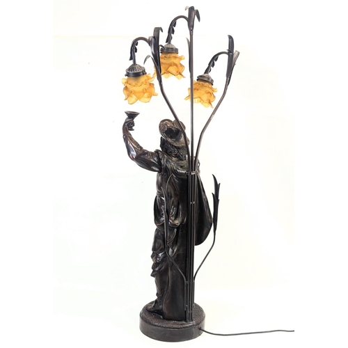 95 - A large resin bronze effect Cavalier lamp. 106cm