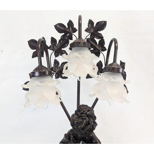 96 - A large resin bronze effect lamp. 80cm