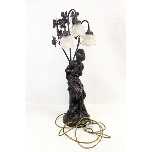 96 - A large resin bronze effect lamp. 80cm