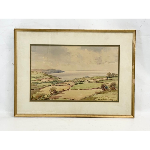 98 - A watercolour painting by Sam McLarnon. Painting measures 46 x 29. Frame measures 63 x 46cm