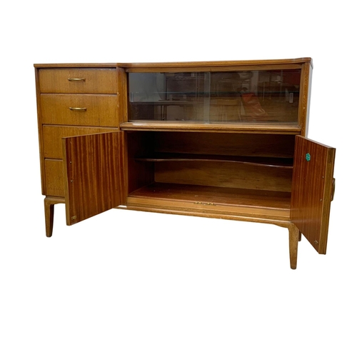 1133 - A vintage oak sideboard by Lebus. 131 x 44 x 93.5cm