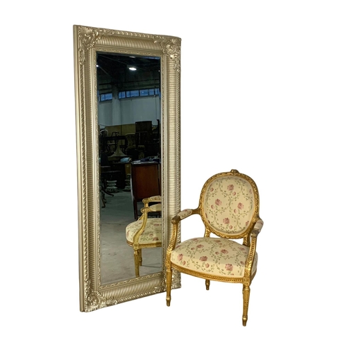 1134 - A very large ornate gilt framed mirror. 80 x 190.5cm