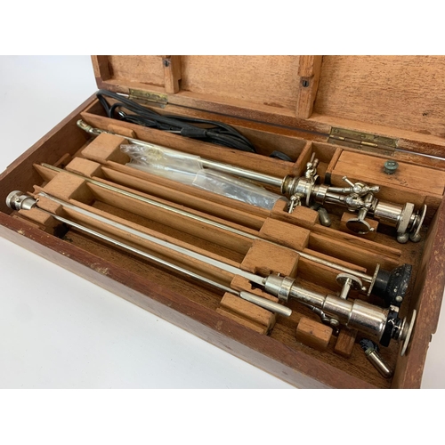 60C - A vintage resectoscope in wooden case. 36.5 x 18.5cm