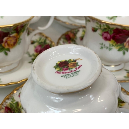 446 - A 22 piece Royal Albert Old Country Roses tea set.