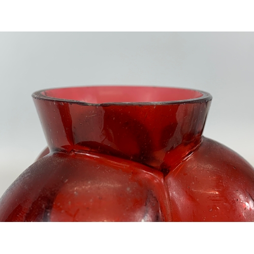 448 - A pair of Victorian Ruby Glass vases. 18.5cm.