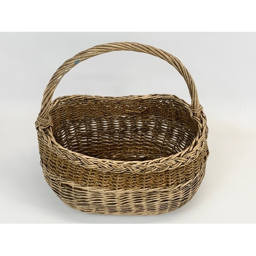 92 - An Edwardian wicker basket. 33 x 34cm.