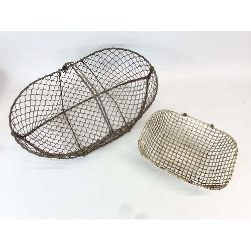 94 - 2 Edwardian period wire baskets. Largest 51 x 34 x 28cm.