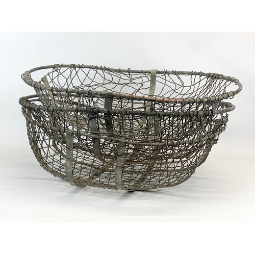 95 - 3 large early 20th century wire baskets.