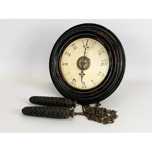 99 - A 19th century Wag on the Wall clock, with weights. 27 x 19 x 22cm.