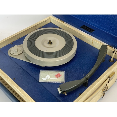 100 - A vintage Dansette record player. 1960. 35 x 32 x 18cm.