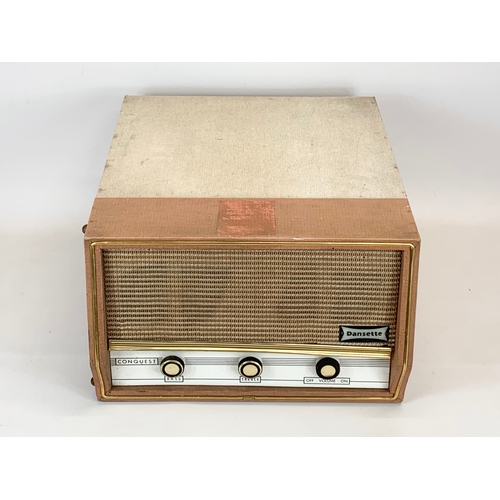 101 - A vintage Dansette Conquest record player. 41 x 49 x 25cm