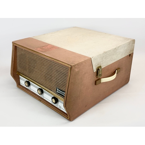 101 - A vintage Dansette Conquest record player. 41 x 49 x 25cm