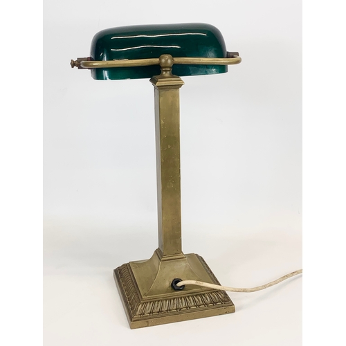 108 - A large vintage brass Bankers Desk lamps, with glass shade. 27 x 43cm.