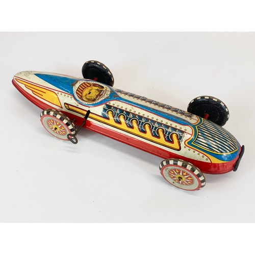 132 - 2 large vintage Marx tin plate windup Streamline race cars. 41cm