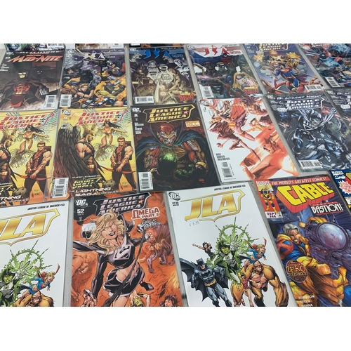 134 - A collection of Marvel and DC comic books.