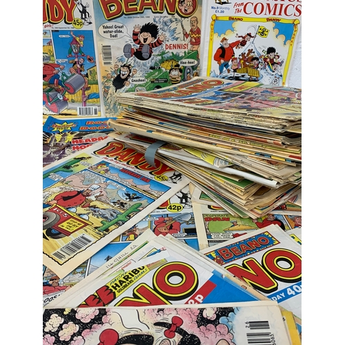 135 - A large collection of The Dandy and The Beano comic books.