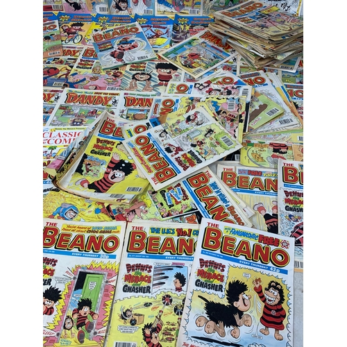 135 - A large collection of The Dandy and The Beano comic books.