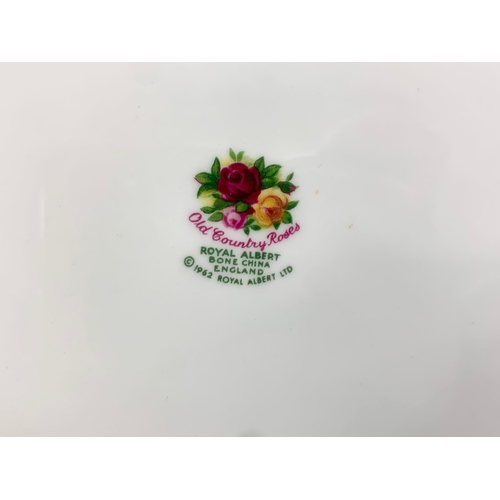 455 - A set of 7 Royal Albert Old Country Roses dinner plates. 27cm.