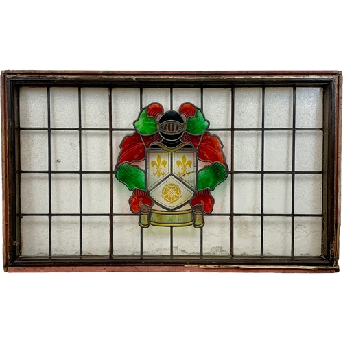 114 - A large late 19th century stained glass panel in wooden frame. 158 x 93cm.