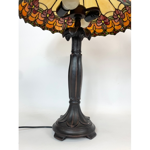 116 - A pair of large Tiffany style table lamps. 41 x 64cm