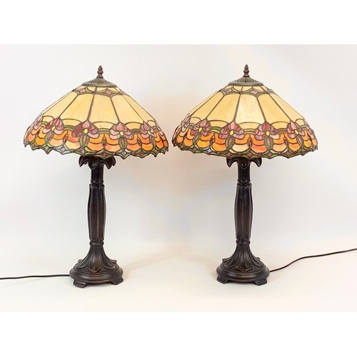 116 - A pair of large Tiffany style table lamps. 41 x 64cm