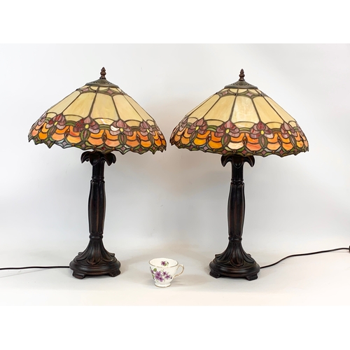 116 - A pair of large Tiffany style table lamps. 41 x 64cm