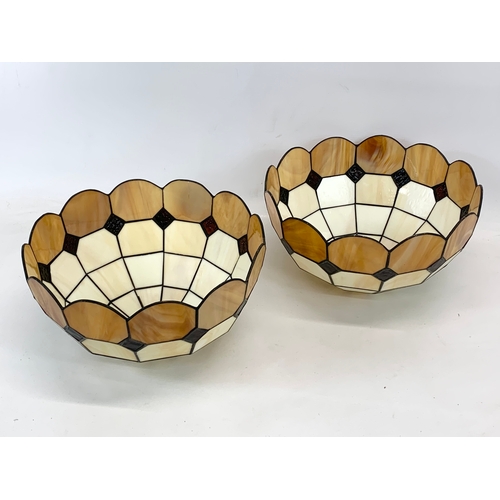 117 - A pair of Tiffany style lamp shades. 30 x 16.5cm