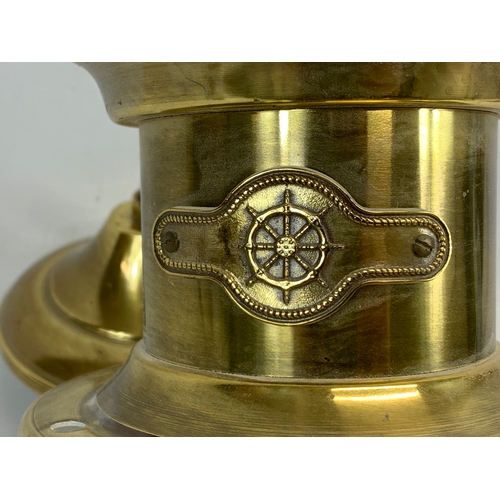 119 - A brass ceiling light. 30 x 55cm including chain.