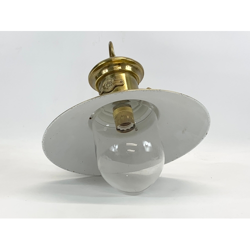 119 - A brass ceiling light. 30 x 55cm including chain.