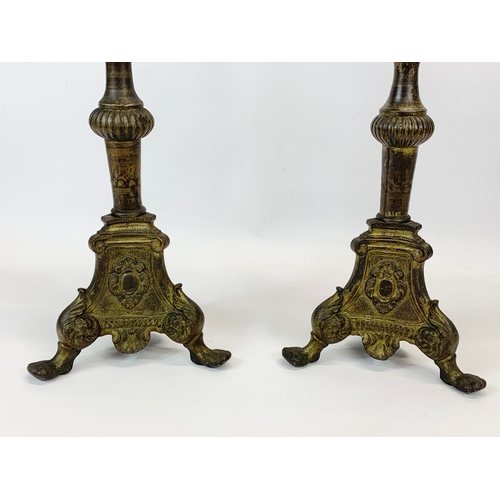 123 - A pair of large late 19th century brass Church candlesticks.