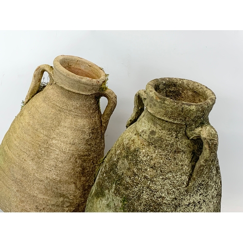 124 - A pair of vintage terracotta garden pots. 42cm