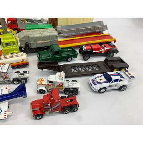 152 - A collection of model cars and trucks etc. Dinky, Corgi, Matchbox, Lesney and French makes.