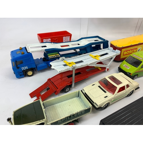 152 - A collection of model cars and trucks etc. Dinky, Corgi, Matchbox, Lesney and French makes.