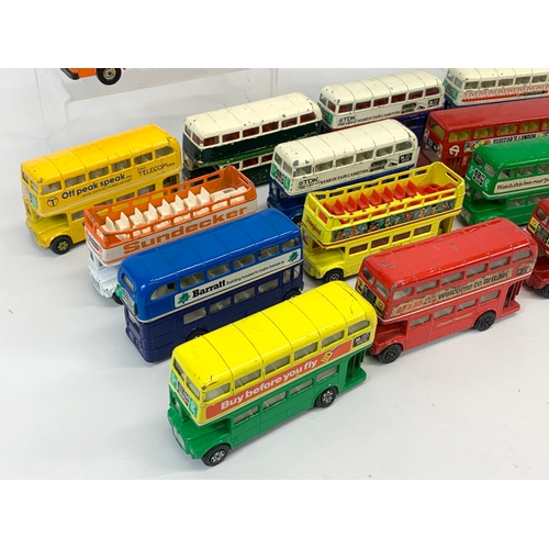 154 - A collection of model buses and tractors etc. Mostly Corgi, including 2 Lone Star tractors.