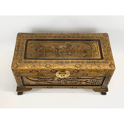 139 - A Chinese carved trunk. 71 x 35 x 37cm