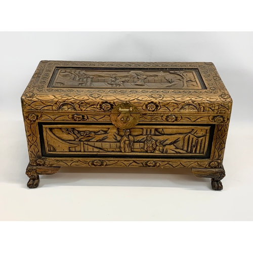 139 - A Chinese carved trunk. 71 x 35 x 37cm