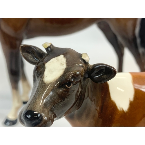 469 - 3 Beswick pottery animals. Horse measures 25 x 20cm.