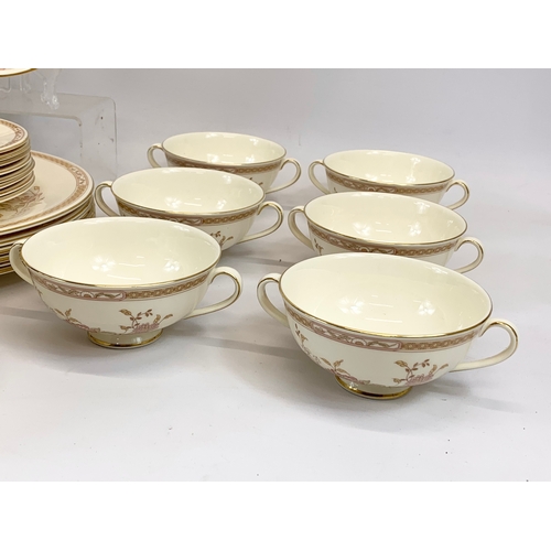 476 - A 46 piece Royal Doulton “Lisette” pattern tea and dinner set. The Romance Collection. 6 soup bowls,... 