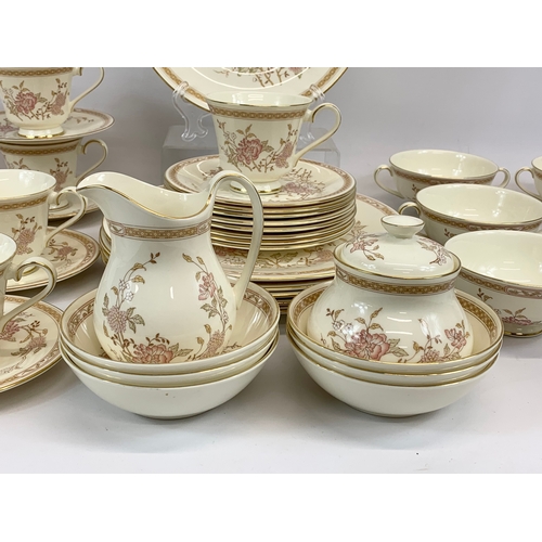 476 - A 46 piece Royal Doulton “Lisette” pattern tea and dinner set. The Romance Collection. 6 soup bowls,... 