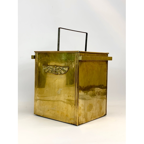 161 - A 1920’s Art Deco Egyptian revival brass peat / coal bucket, with liner. 33 x 27 x 33cm