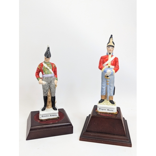 480 - 5 pottery soldiers on wooden bases. Tallest 21.5cm