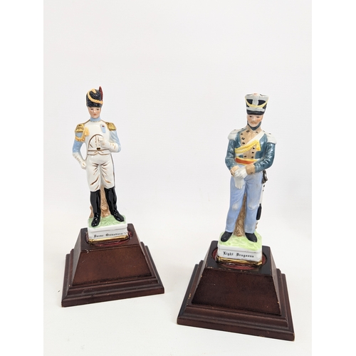 480 - 5 pottery soldiers on wooden bases. Tallest 21.5cm