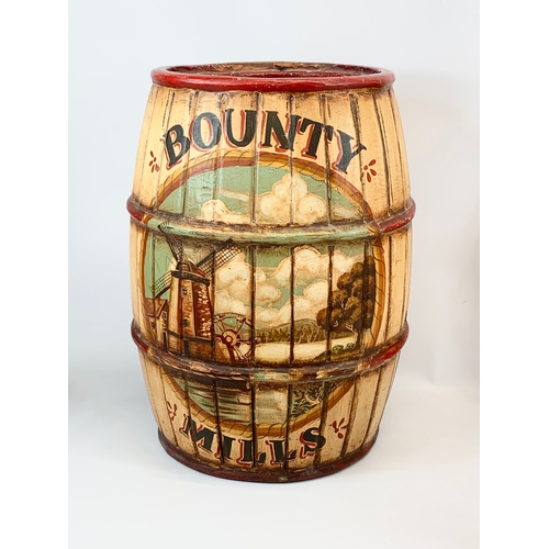 172 - A large wooden barrel shape umbrella stick stand. Bounty Mills. 39 x 55cm