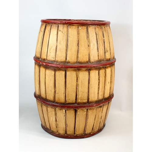 172 - A large wooden barrel shape umbrella stick stand. Bounty Mills. 39 x 55cm