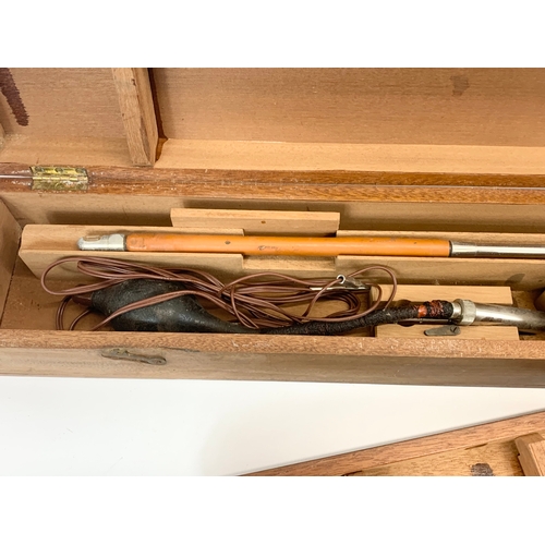 189 - 2 vintage medical instruments by Genito Urinary MFG Co LTD, in wooden cases. Gastroscope and other. ... 