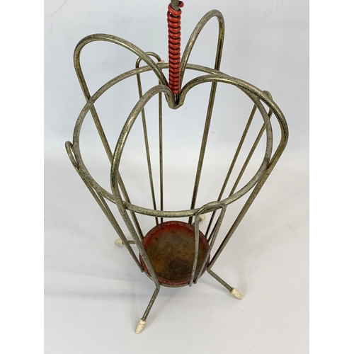 194 - A 1960’s Mid Century umbrella stick stand. 81cm