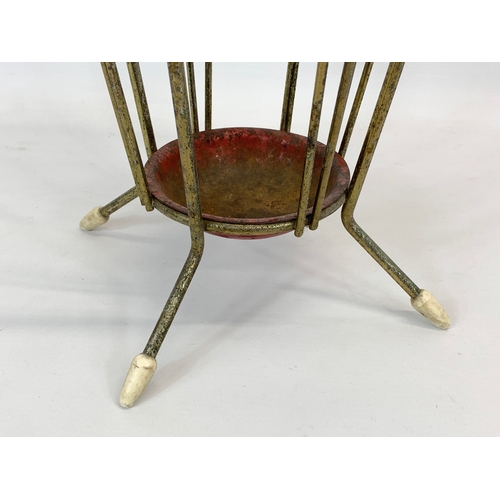 194 - A 1960’s Mid Century umbrella stick stand. 81cm