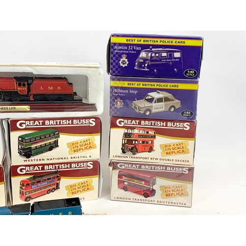 147 - A collection of Atlas Editions model trains and buses.